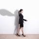Business woman and shadow